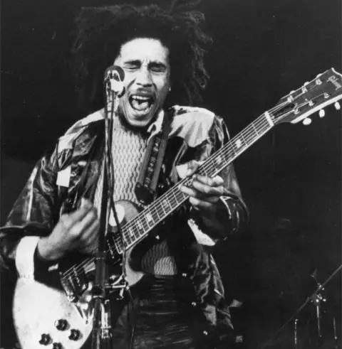 Getty Images Bob Marley performing at an unknown venue in 1973