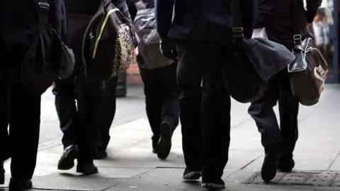 PA Media children with bags