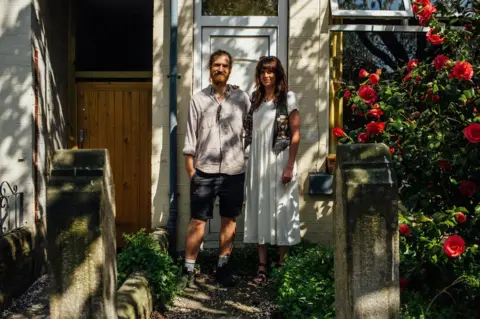 Ellie Grace Photography Doorstep portrait of Ben and Shannon in Heeley