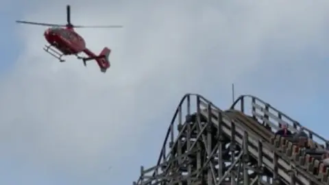 Wales Air Ambulance was seen taking an individual from the scene