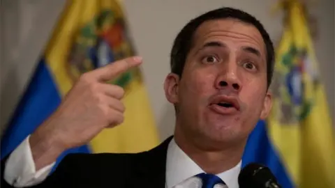 EPA Venezuela's National Assembly President Juan Guaido speaks during a press conference, in Caracas, Venezuela, on 05 December 2020.