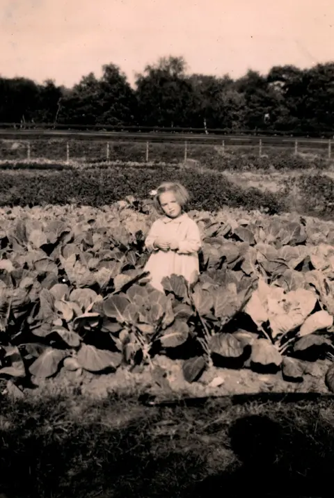 Christine Regas Christine Regas as a young girl on allotment