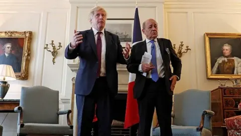 PA Boris Johnson meeting his French counterpart Jean-Yves Le Drian