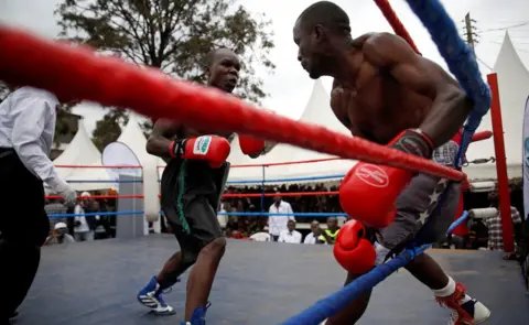 Reuters Boxers fight during an east African boxing tournament in the Kibera slum in Nairobi, Kenya, July 29, 2018.