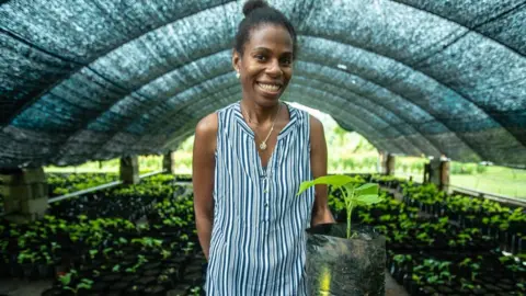 Chris Morgan/BBC Nicole Paraliyu in a Kava farm