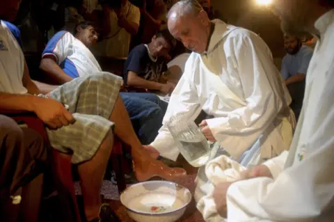 Reuters Cardinal Bergoglio washing the feet of residents during a mass for Holy Thursday in Buenos Aires in March 2008