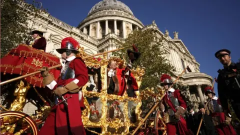 PA Media Michael Mainelli, the 695th Lord Mayor of the City of London, in the State Coach passing St Paul's Cathedral