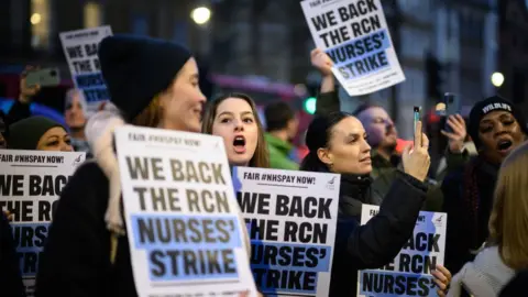 Getty Images Nurses on strike earlier in December