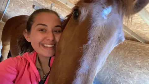 Macy Window Macy Window before the accident, with a horse