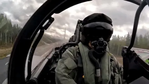 MOD CROWN COPYRIGHT Pilot landing the aircraft