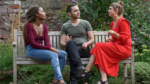 DAVE PRATT Dr Katie Bales (right) talking to sanctuary students Stella Ogunlade and Sarmad Ozan