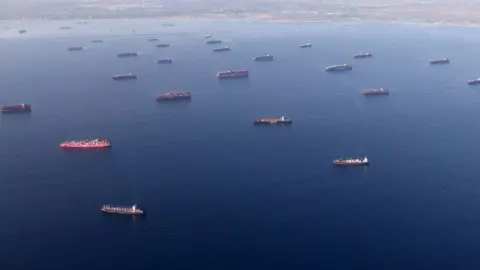 Getty Images container ships are anchored by the ports of Long Beach and Los Angeles