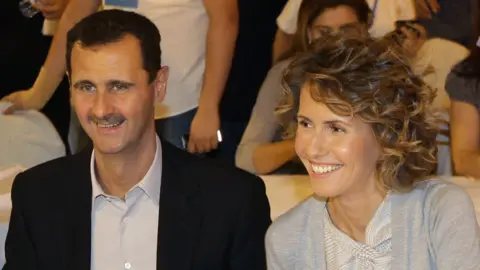 AFP Syrian President Bashar al-Assad and wife Asma in Damascus, 5 Sep 10