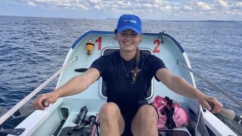 Solo Atlantic rower Miriam Payne finishes in race record time - BBC News