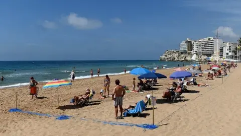 EPA Social distancing measures are in place on the beach in Benidorm