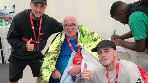 Handout Kurtis Walker with John Curd and Connor Hodgson