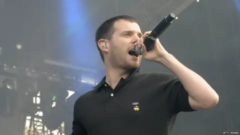 Getty Images Mike on stage