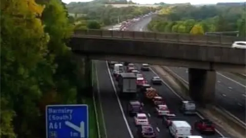 Traffic queuing on the approach to the closure