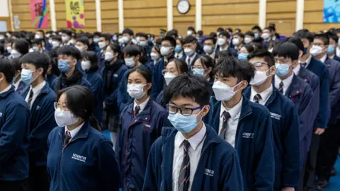 EPA Students at a Hong Kong school at an assembly memorialising Jiang Zemin