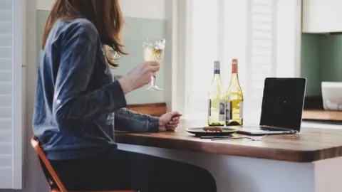 Getty Images Woman drinking wine