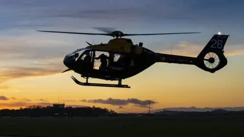 RAF Helicopter in sunset