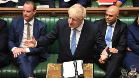 UK Parliament Boris Johnson gave his first statement to the Commons as PM, flanked by his new Foreign Secretary, Dominic Raab (l), and his new Chancellor, Sajid Javid