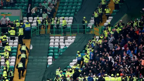 Reuters Supporters at the end of the match