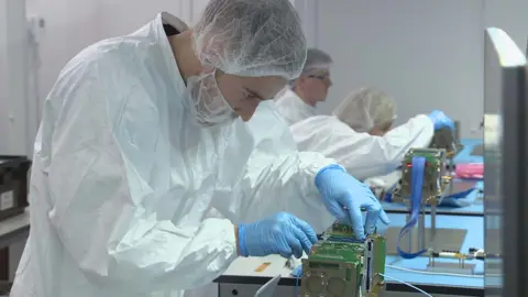 working on the satellite