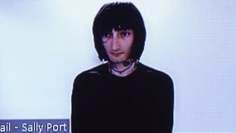 Getty Images The accused gunman appeared in court on Wednesday