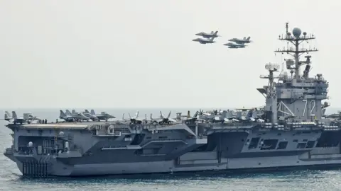 EPA US Navy handout file photo showing the USS Abraham Lincoln (9 February 2012)