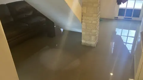 Ground level at a house under water