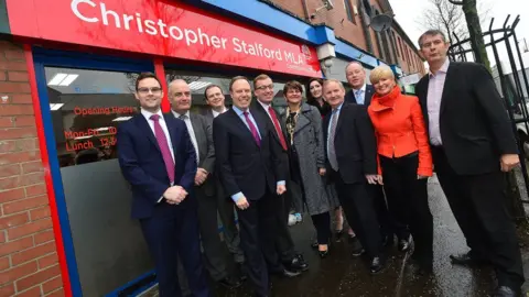 PACEMAKER Mr Stalford with party colleagues at the opening of his constituency office in 2016