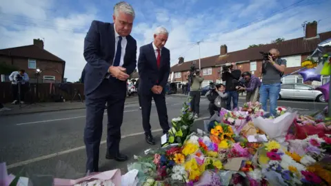 PA Media Ambassador of Liverpool FC, Ian Rush (right), and the Ambassador of Everton FC, Ian Snodin, visits the scene in Kingsheath Avenue