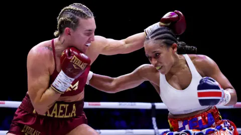 Mikaela Mayer punches Natasha Jonas