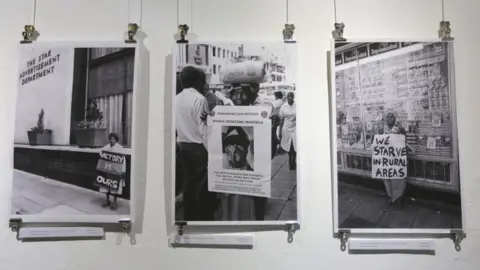 EPA A view of images on display at the "DocuFest Africa" exhibition which opened this week at the FotoZa Gallery in Johannesburg, South Africa, 07 May 2018. The body of work is from the Tiso Blackstar Group Collection, as well as photographers including Paul Weinberg, Gille De Vlieg, Eric Miller and David Larsen and includes images from the 1950s to the 1980s depicting the high of the Apartheid rule of the all white nationalist government.