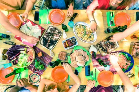 Getty Images food and phones on table