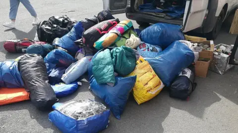 Carlisle Refugee Action Group Leftover tents collected at the end of Kendal Calling