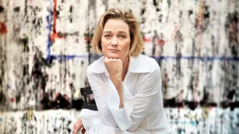 Corbis via Getty Images Delphine Boël, the alleged illegitimate daughter of King Albert II of Belgium, posing at an exhibition