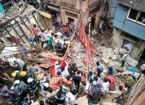 Mumbai Fire Department Forty people are feared trapped inside the building in Dongri