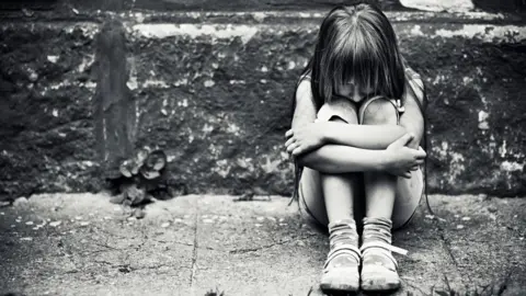 Getty Images Child (actor) on step