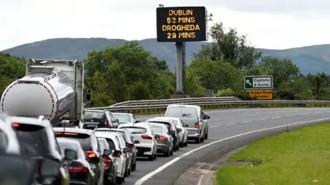 Reuters Cars on motorway approaching the border between Northern Ireland and Ireland