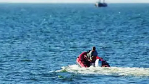 sbna Police surveillance of the dinghy on a test run