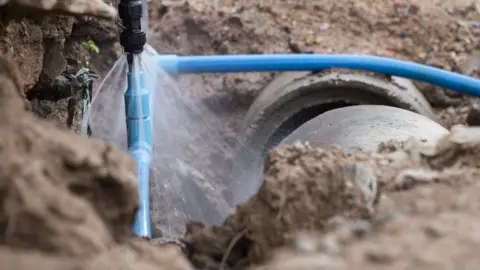 Getty Images Burst pipe