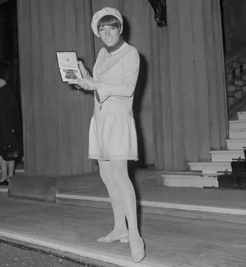 Getty Images Mary Quant at Buckingham Palace after receiving an OBE (Order of the British Empire) for her outstanding contribution to the fashion industry, London, 15th November 1966.