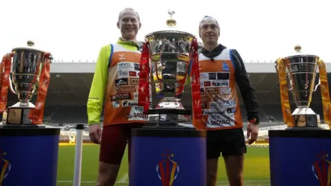 Andrew Barton Rugby League CEO John Dutton and Kevin Sinfield pose with the Rugby League World Cup