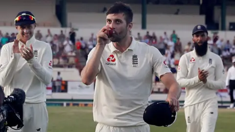Mark Wood celebrates his five-wicket haul