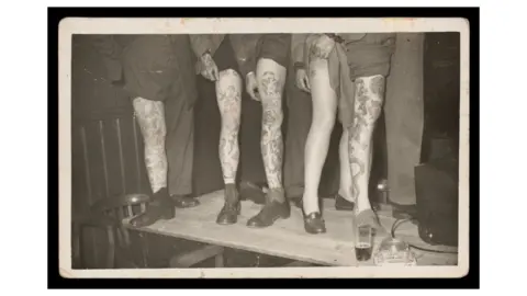 Neil Hopkin-Thomas/Amgueddfa Cymru Jessie's tattoos on legs