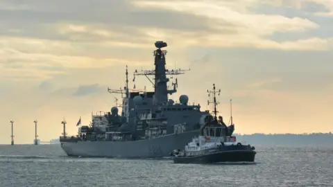 PA Media HMS Lancaster leaving Portsmouth
