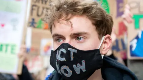 Getty Images Teenage Climate Crisis activists from various climate activism groups protesting during the first UK Students Strike Over Climate Change march of 2020 on 14 February 2020 in London, England