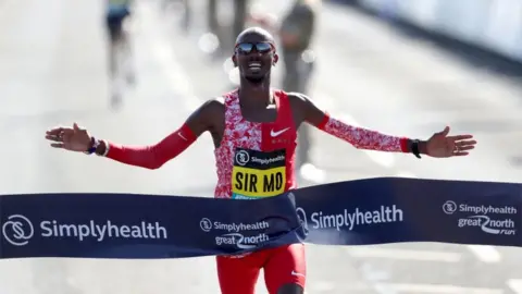 PA  Sir Mo Farah winning the men's elite race